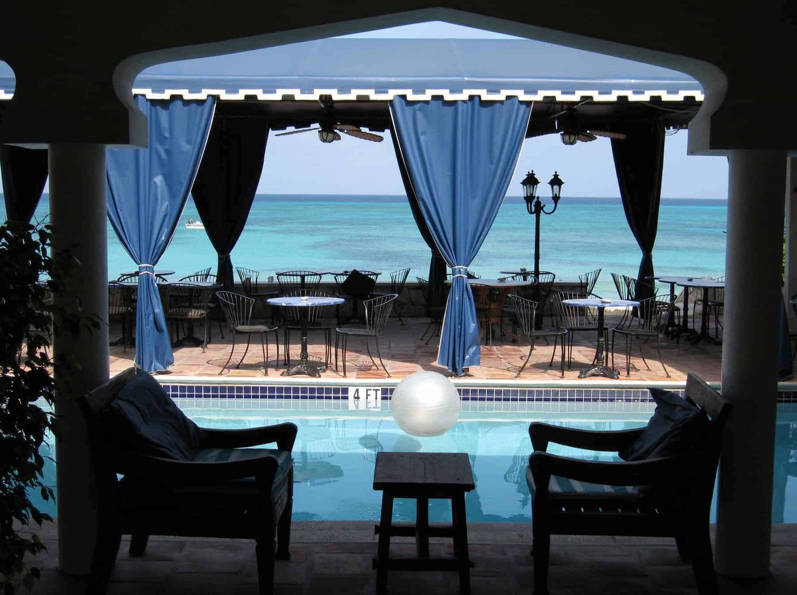 Open foyer of a hotel on grand turk, turks & caicos, overlooking the carribean sea;