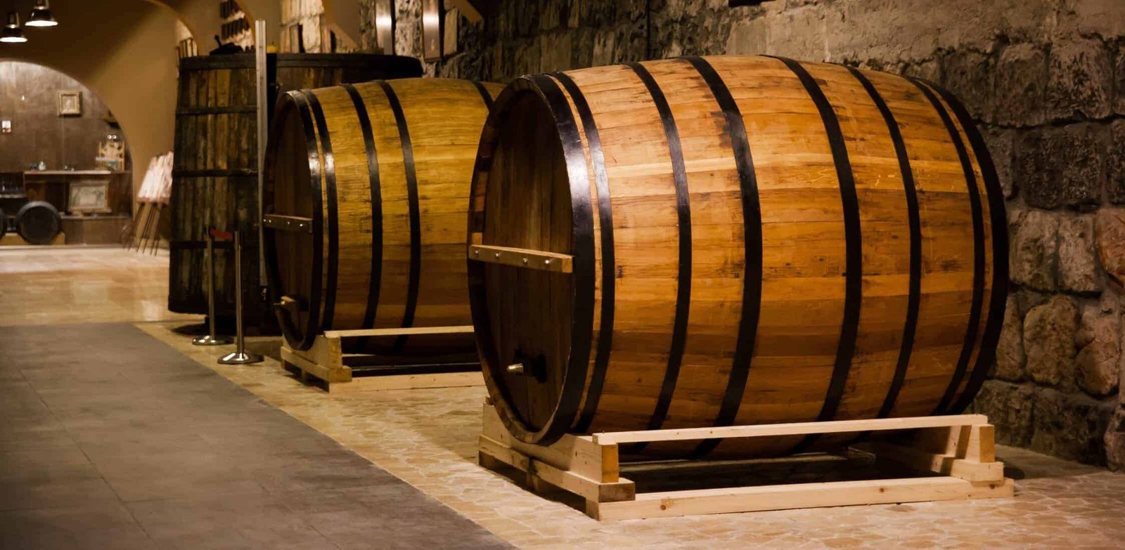 Cognac barrels in cellar old factory in Yerevan Armenia