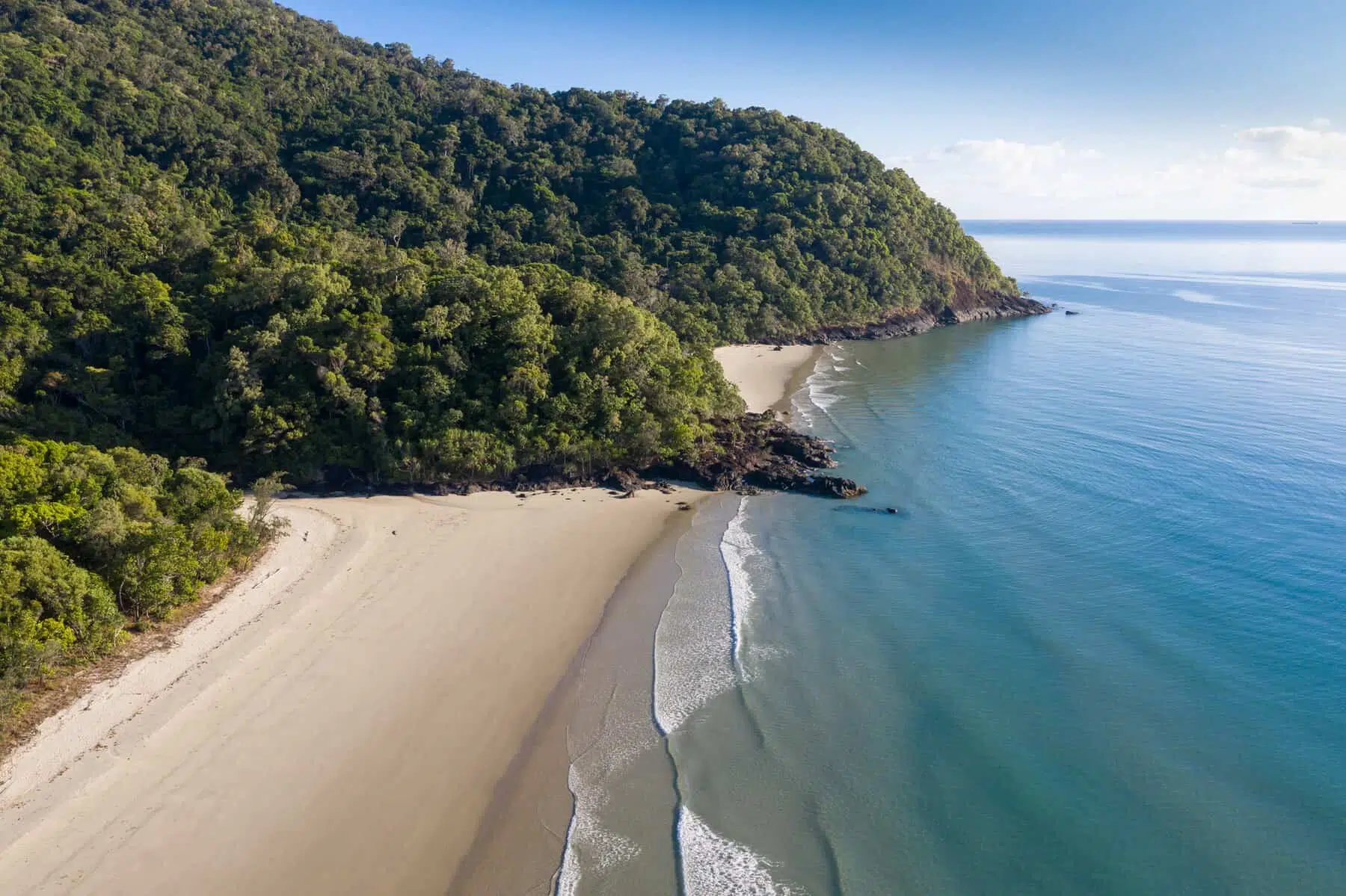 Noah Beach located on the Daintree coast north of Cairns. The rainforest meets the ocean in this pristine section of coastland in Queensland Australia.