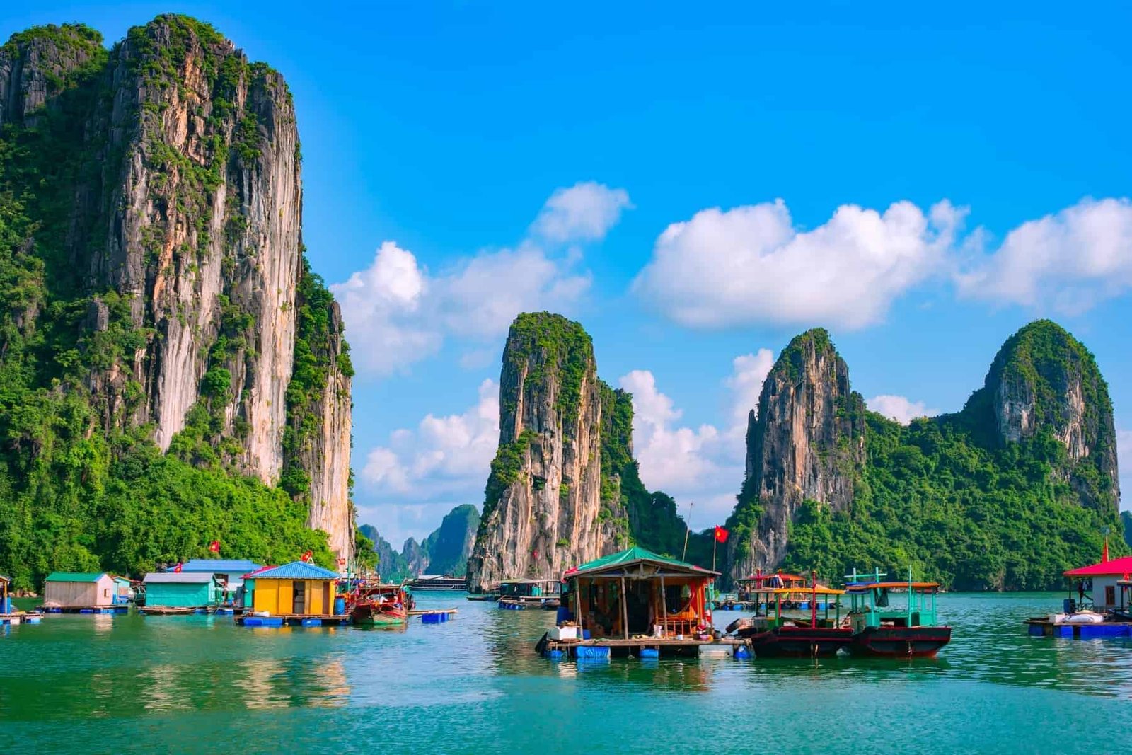 Ha Long Bay. Interesting places to visit in Vietnam. Floating fishing village and rock island in Halong Bay, Vietnam, Southeast Asia. UNESCO World Heritage Site. Junk boat cruise to Ha Long Bay. Landscape. Popular landmark, famous destination of Vietnam