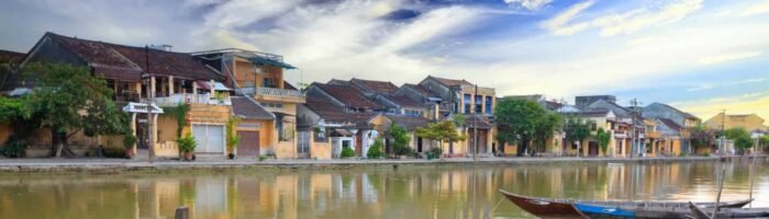 View on the old town of Hoi An from the river. Boats in the foreground. Vietnam