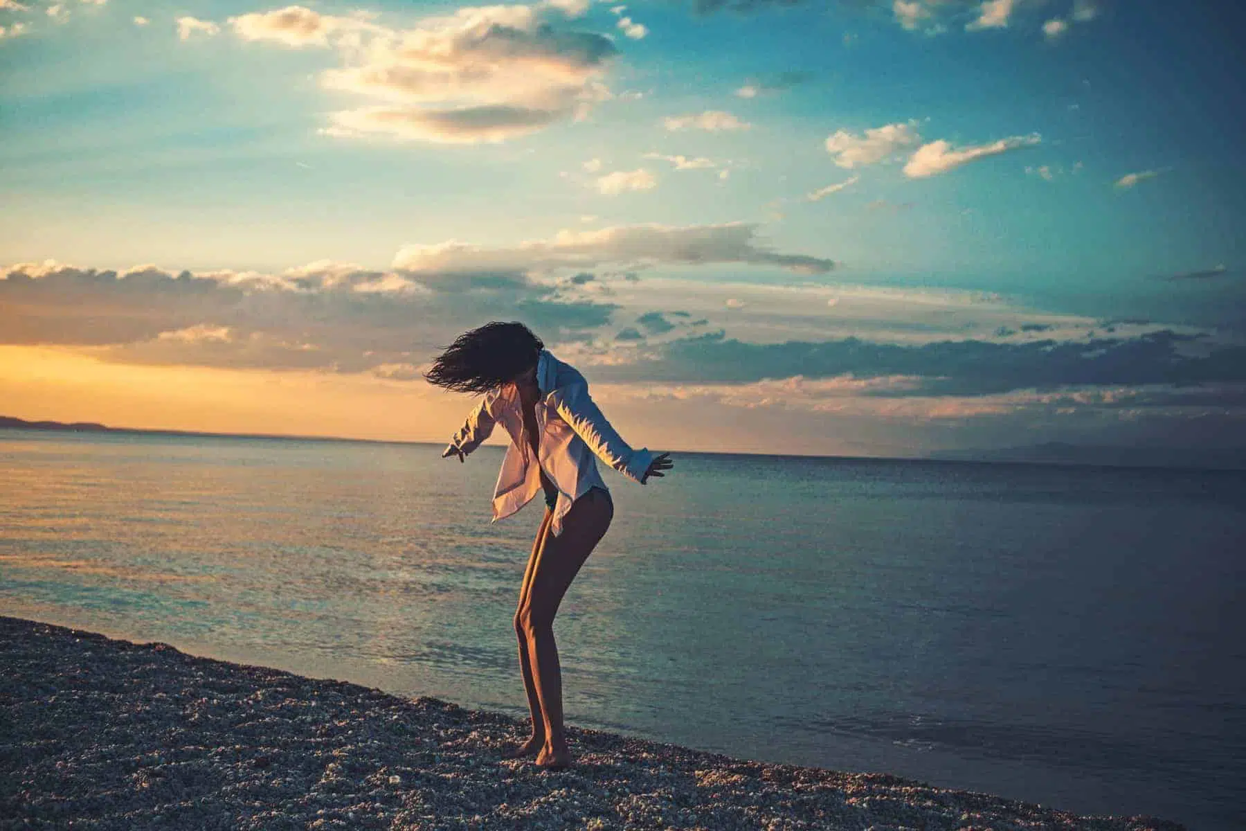 Bahama girl dancing in the sunset