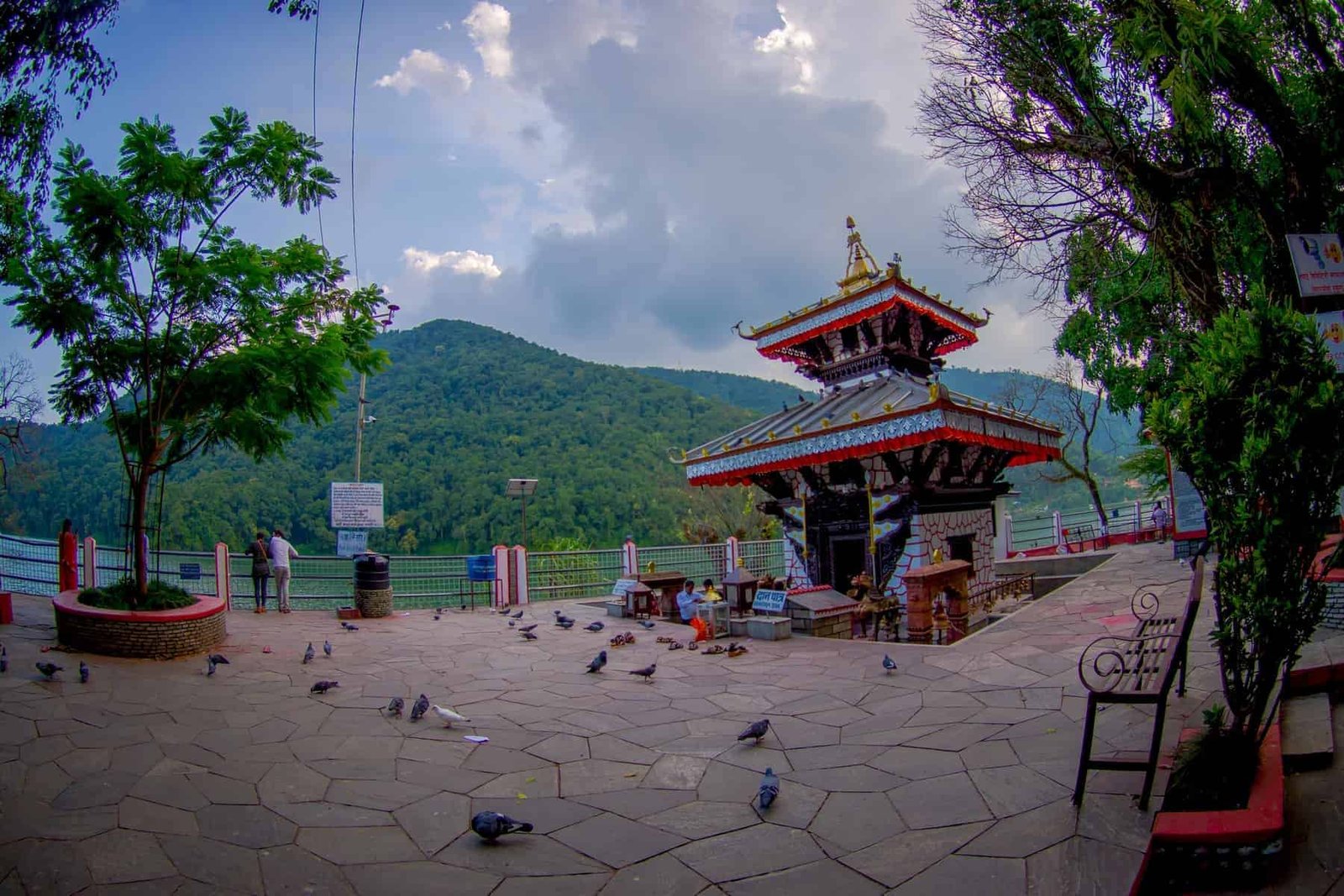 POKHARA, NEPAL - People walking around of Tal Barahi Temple, located at the center of Phewa Lake, is the most important religious monument of Pokhara.
