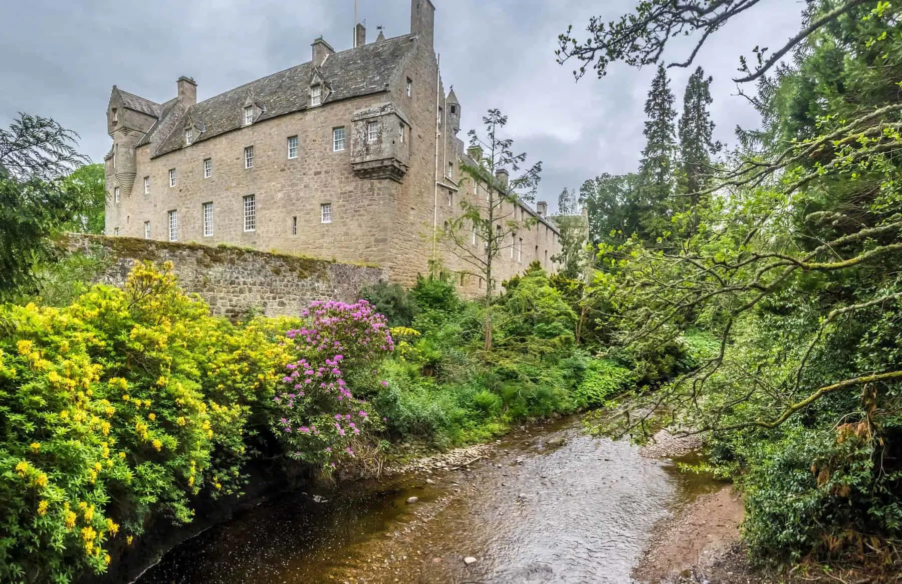 Cawdor castle and its magnificent laburnum arch and river - Scotland