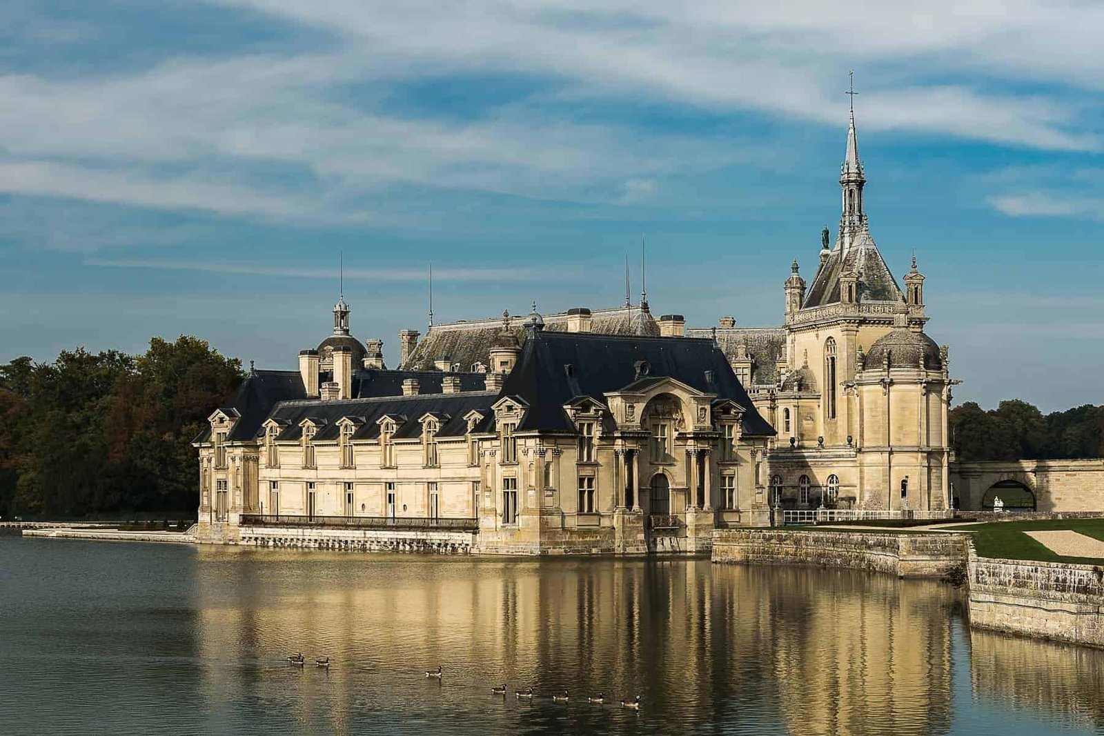 Chateau de Chantilly and the geese crossing the pond