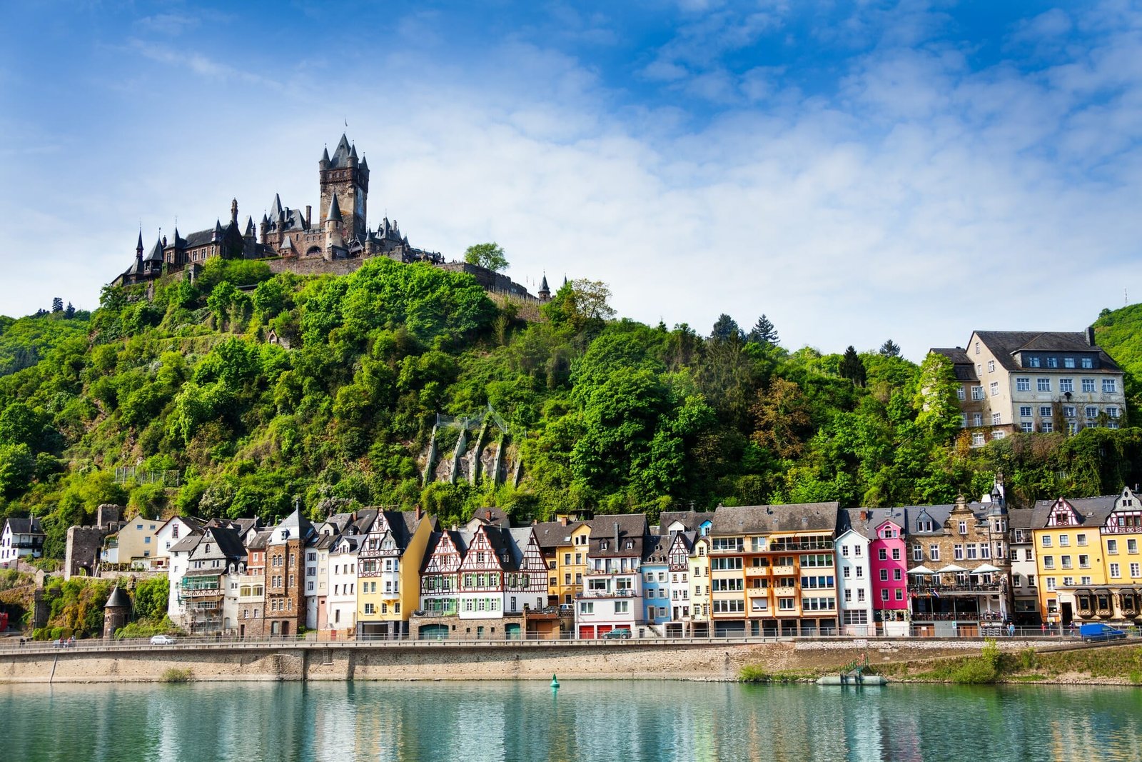 Cochem Imperial Castle on the mountain and Mosel river bellow at spring, Germany