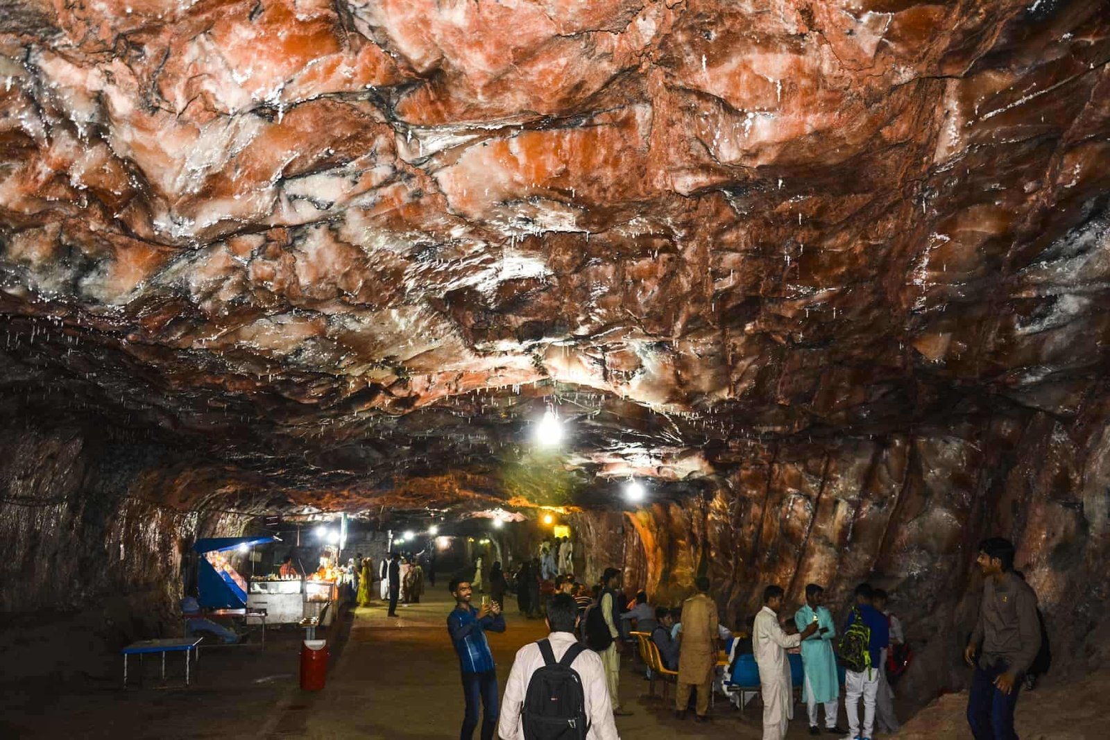 Inside view of Khewra salt mine - Khushab, Pakistan. Beautiful lighting is used which leaves magical effect upon tourists. The Khewra Salt Mine is located in Khewra, north of Pind Dadan Khan, an administrative subdivision of Jhelum District, Punjab Region, Pakistan, which rises from the Indo-Gangetic Plain.