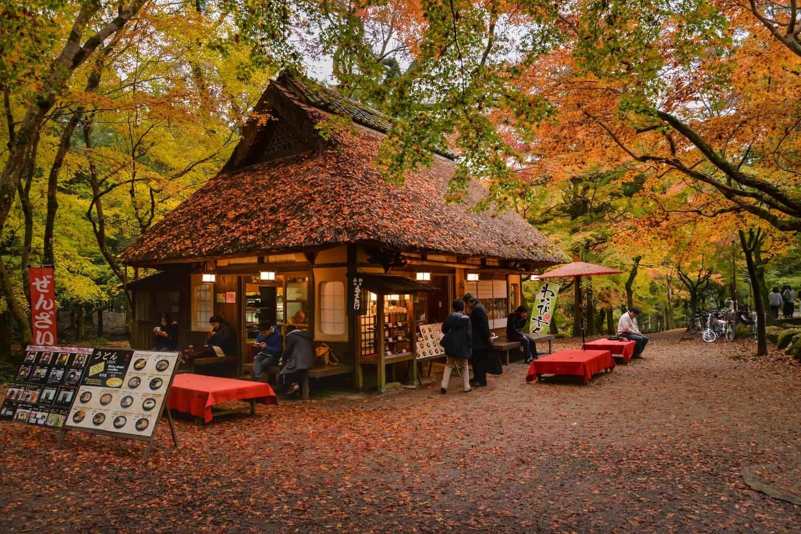 Nara, Japan. Tourists are taking a rest, having some food and tea at traditional style teahouse after a walk in Nara Park, Nara, Travel guide to Japan.