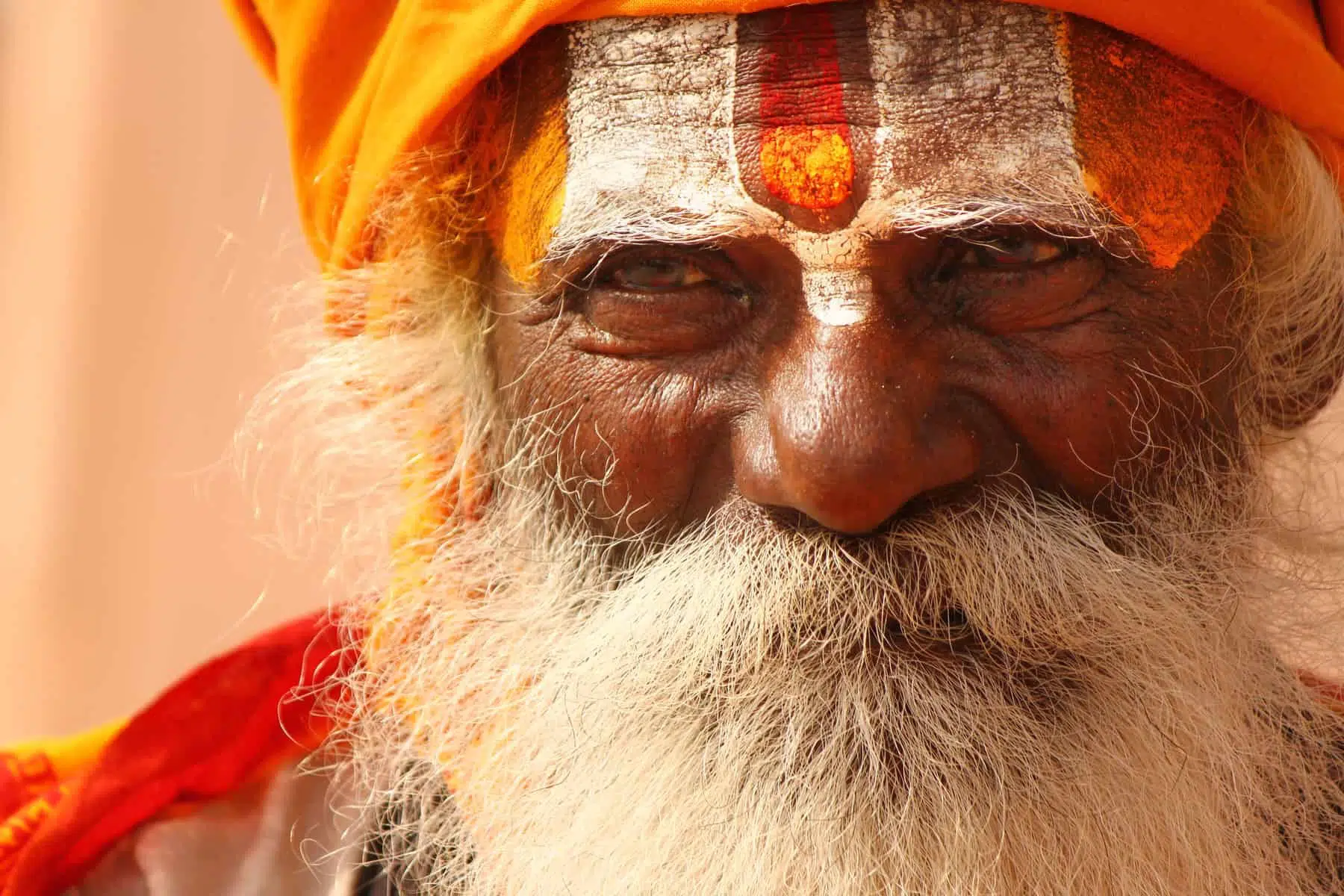 A Hindu monk, painted his forehead with holy colors on the bank of river Ganga, at Varanasi, India. It is said that Varanasi is the oldest living city on earth. they are known as sadhus. Sadhus engage in a wide variety of religious practices. Some practice extreme asceticism while others mainly focus on praying, chanting or meditating.