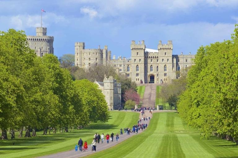 The UK open to tourism. Front spring view of Windsor castle and long walk, England