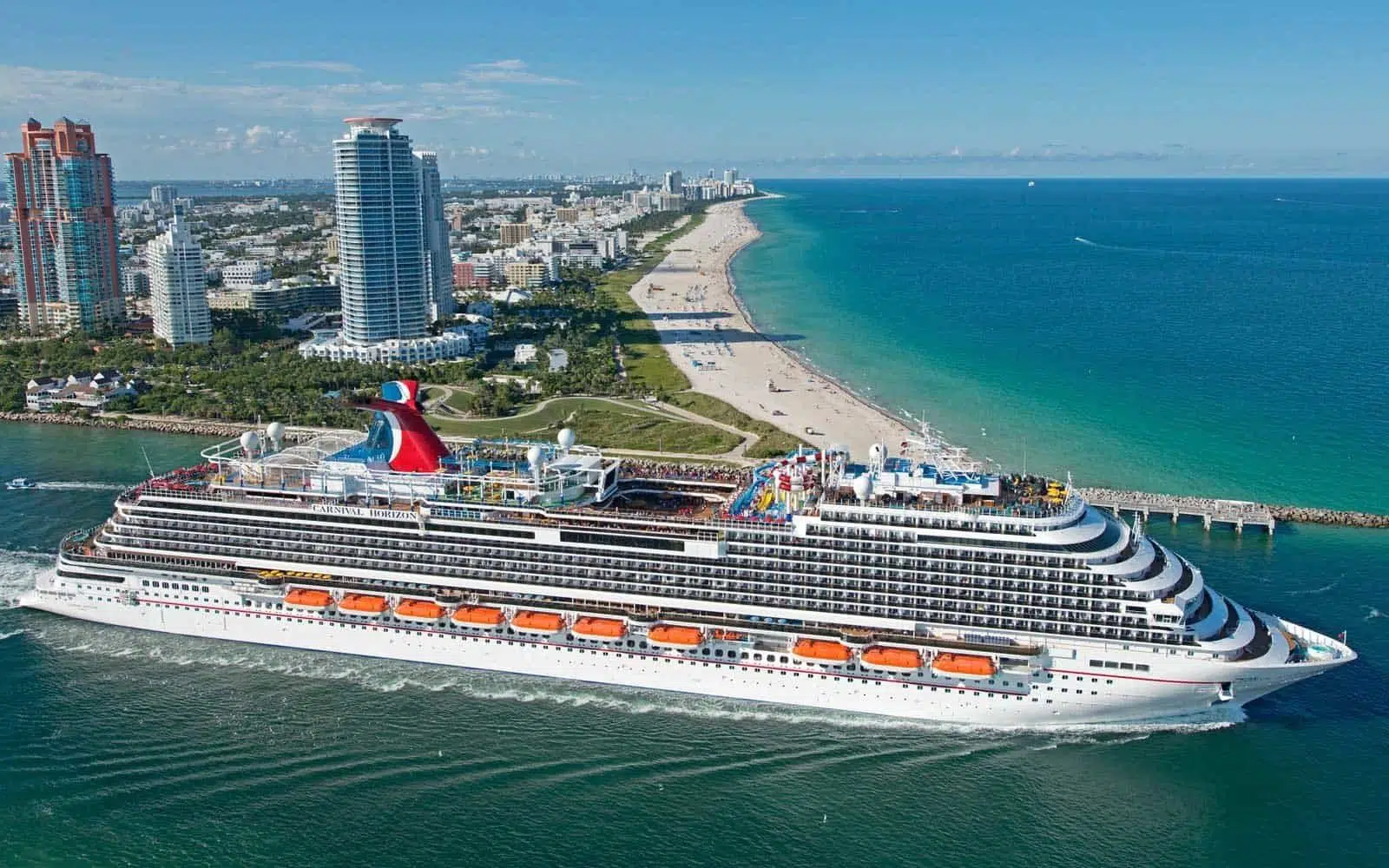 The new Carnival Horizon, the 26th ship for Miami-based Carnival Cruise Line, passes by South Beach in Miami Beach, Fla., on a two-day inaugural cruise Thursday, Sept., 20, 2018. Horizon is cruising on year-round six- and eight-day Caribbean voyages from PortMiami. The 1,055-foot-long vessel accommodates more than 4,000 guests and some 1,450 crew members. FOR EDITORIAL USE ONLY (Andy Newman/Carnival Cruise Line/HO)