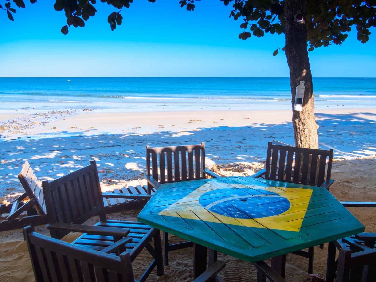 Main beach of the village with table with the flag of Brazil - Jericoacoara National Park - State of Ceara - Brazil