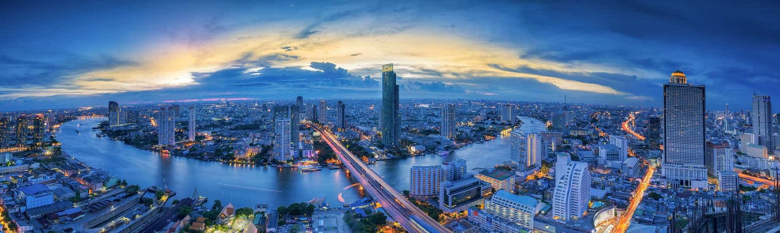 Landscape of River in Bangkok city in night time with bird view