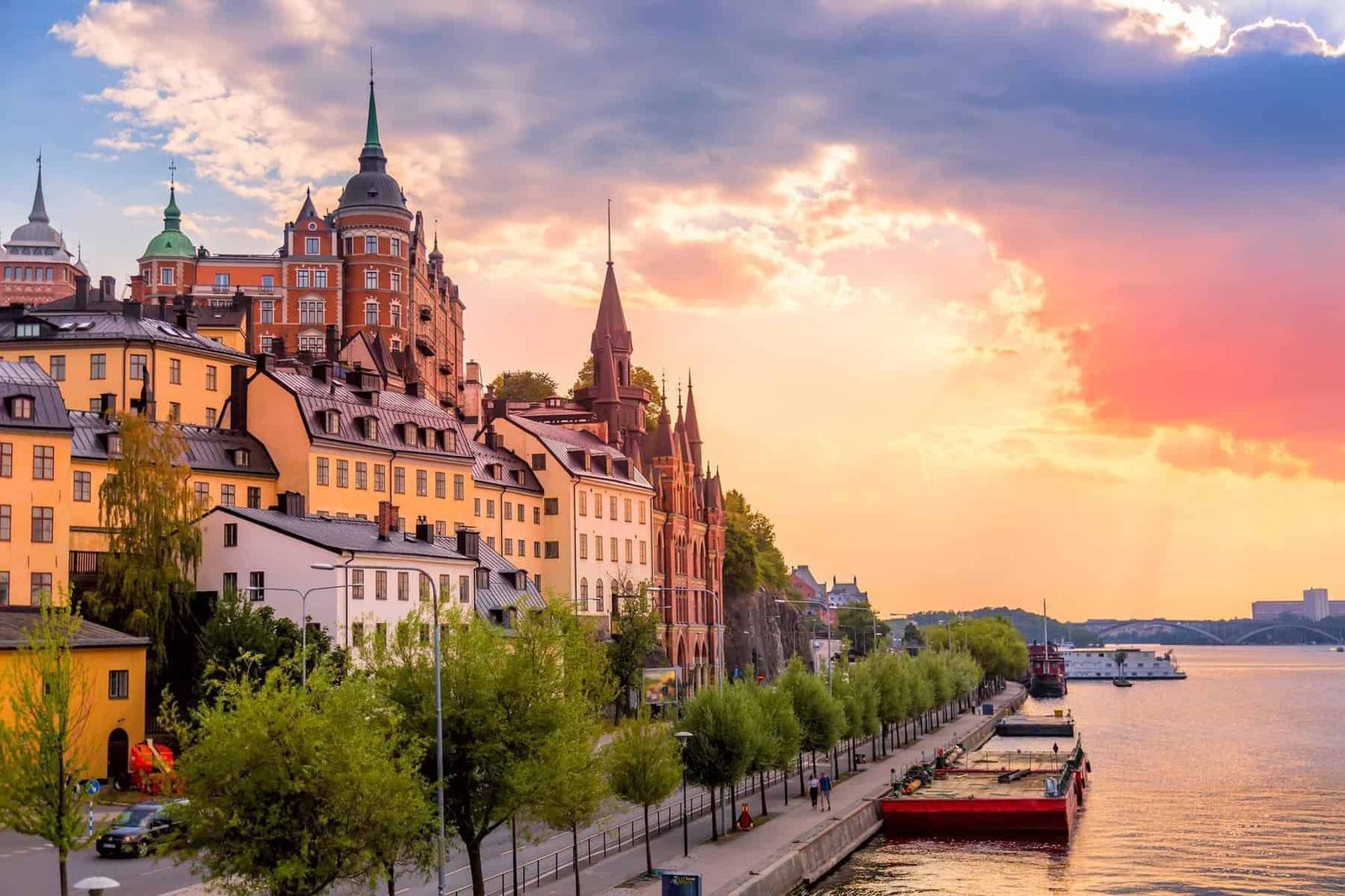 Travel to Sweden, Stockholm. Sweden. Scenic summer sunset view with colorful sky of the Old Town architecture in Sodermalm district.