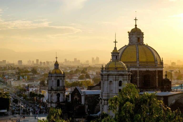 Spanish speaking countries.Scenic view at Basilica of Guadalupe with Mexico city skyline at sunset, Mexico