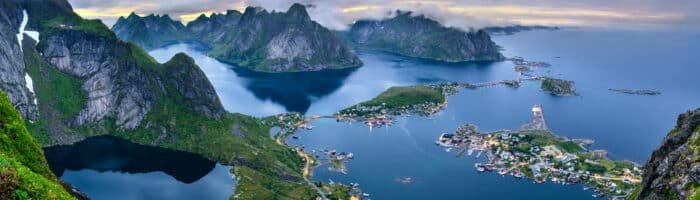 Travel Agencies around the world. Mountains and Reine in Lofoten islands, NorwayAgencies around the worldmountains and Reine in Lofoten islands, Norway