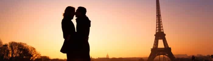 loving couple kissing on Eiffel Tower background, Paris, France