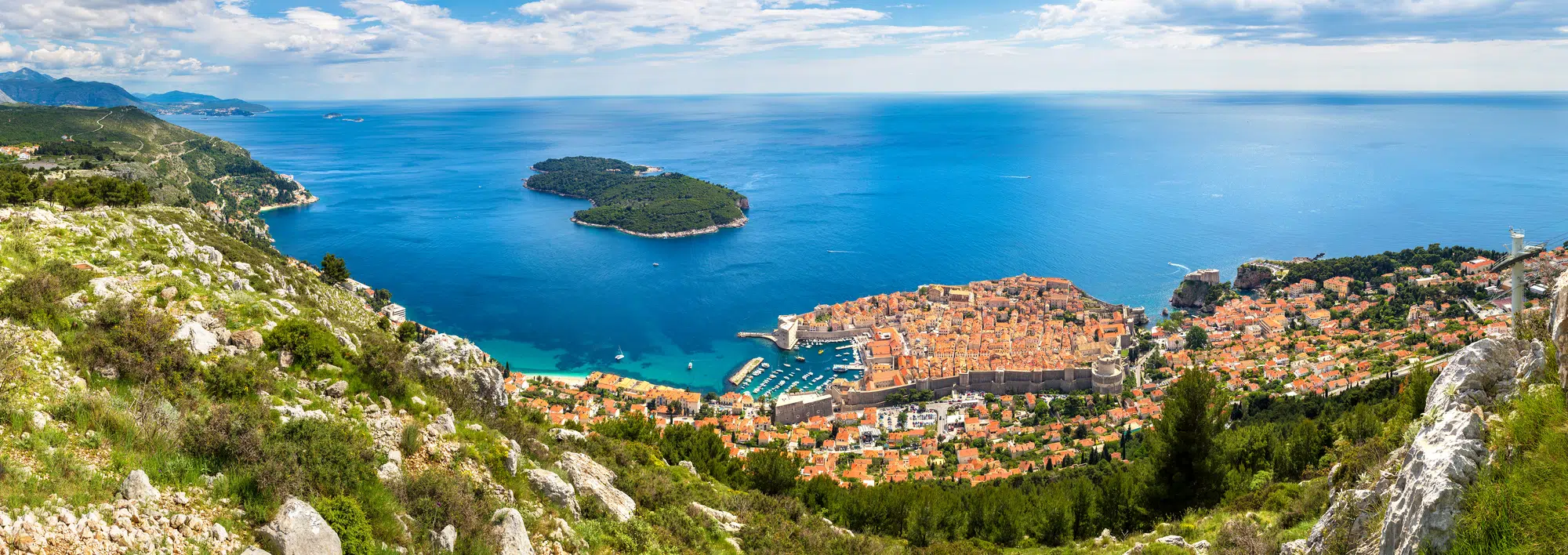 Panorama of old city Dubrovnik in a beautiful summer day, Croatia. Luxury travel in Europe