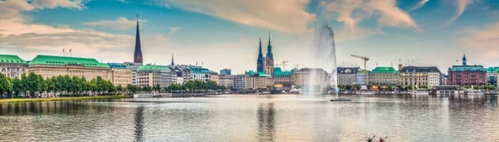 Binnenalster (Inner Alster Lake) in golden evening light at sunset, Hamburg, Germany