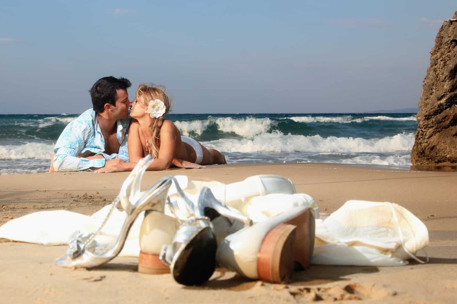 Bride and groom by the sea on their wedding day