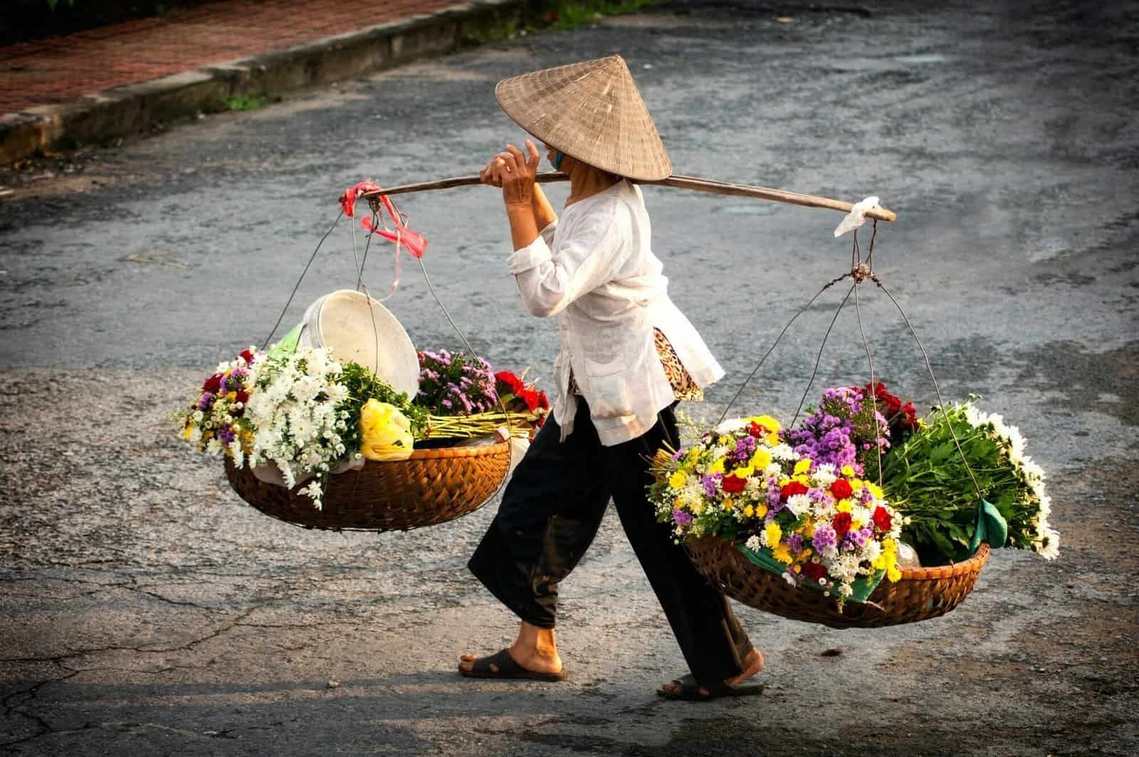 Fascinating travel spots in Vietnam. Hanoi florist vendor on Hanoi street, Vietnam