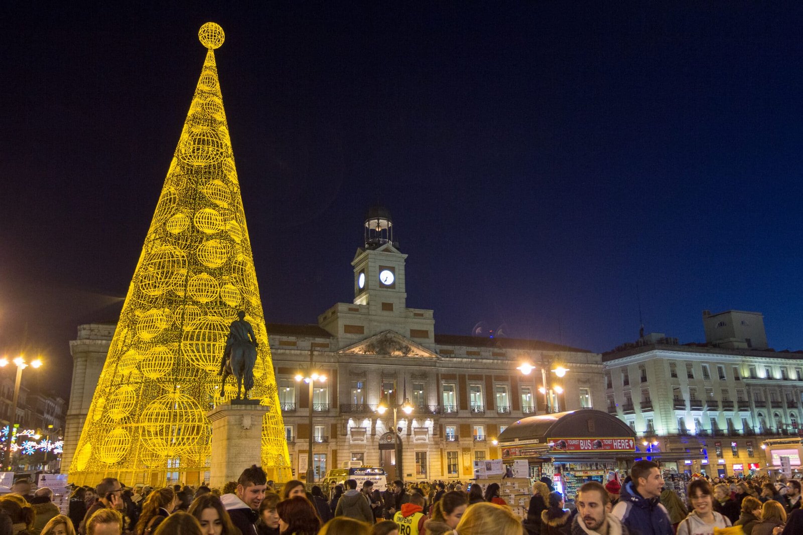 The famous Puerta del Sol in Madrid, Spain crowded shopping for christmas