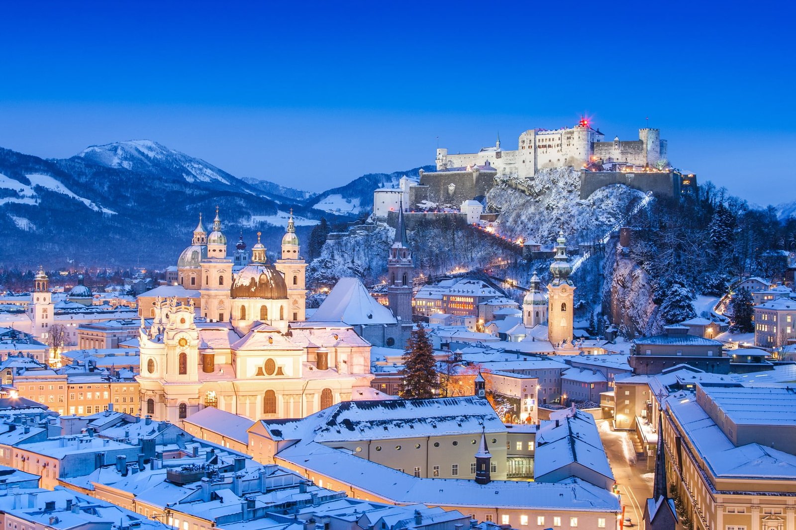 Historic city of Salzburg with Festung Hohensalzburg in winter, Salzburger Land, Austria. Christmas around the world