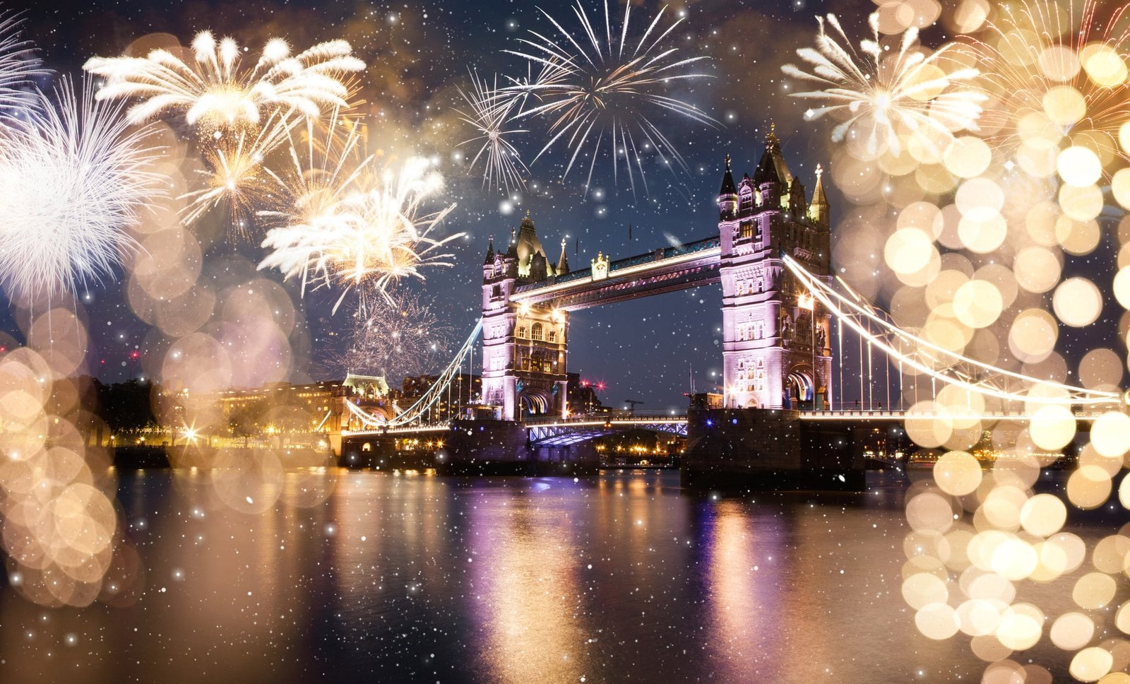 Tower Bridge with fireworks celebration of the New Year in London