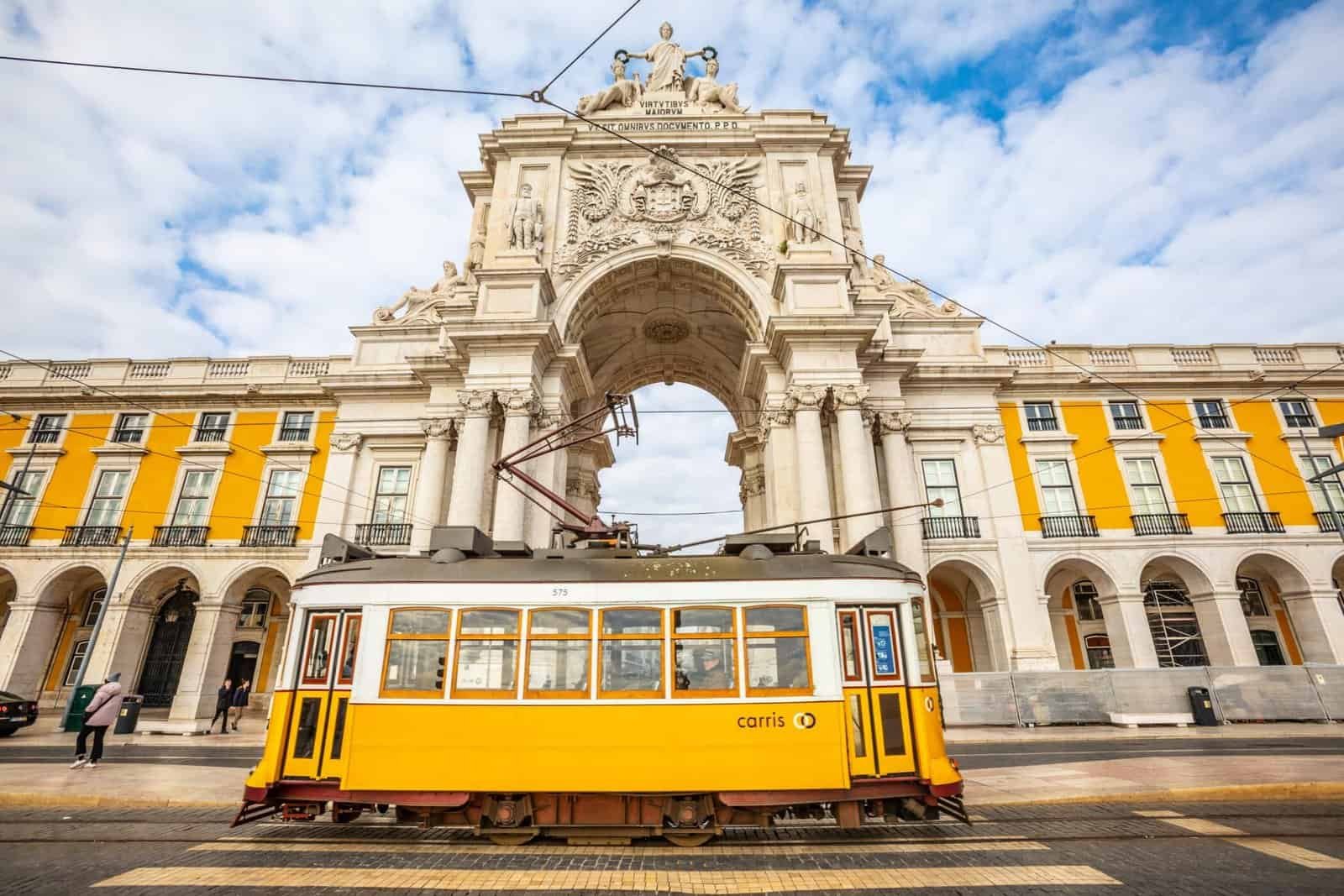 Lisbon, Rua Augusta arch and tram in the historical center, Portugal.