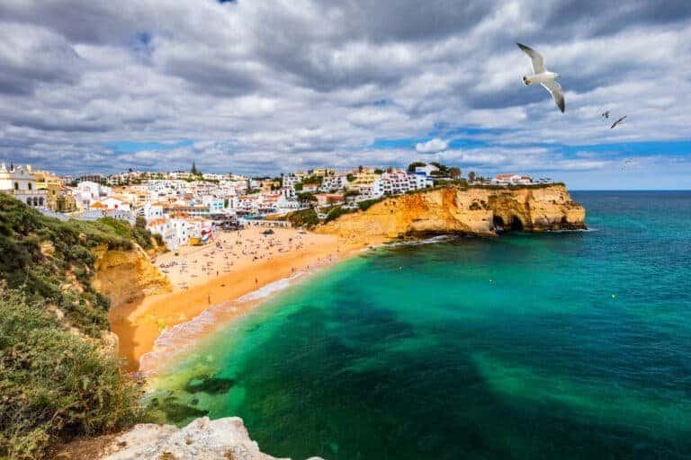 View of Carvoeiro fishing village with beautiful beach, Algarve,