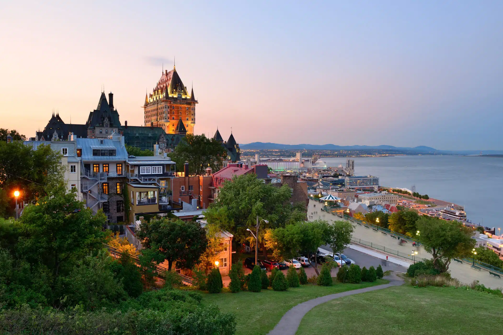 Quebec City skyline with Chateau Frontenac at sunset viewed from hill