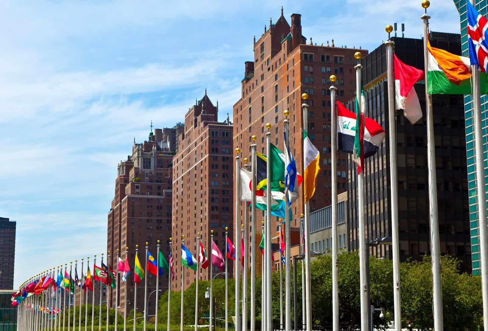 United Nations Headquarters with flags of the members of the UN