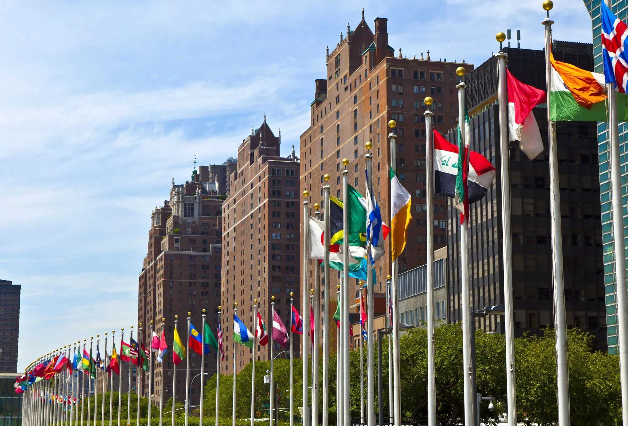 United Nations Headquarters with flags of the members of the UN