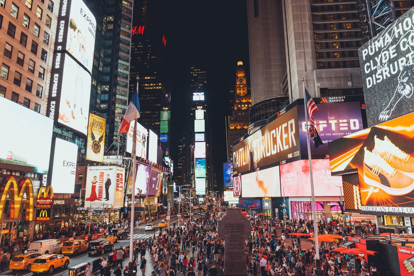 Crowded times square in New York at night, USA