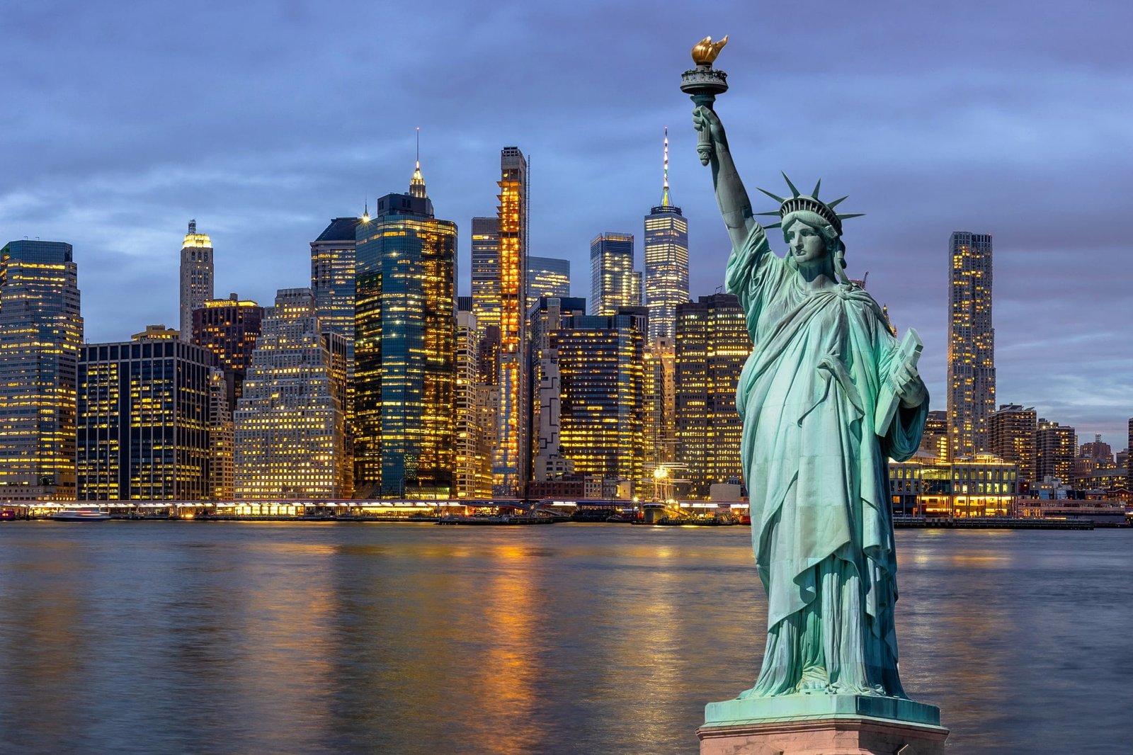 The Statue of Liberty over the Scene of New York Cityscape