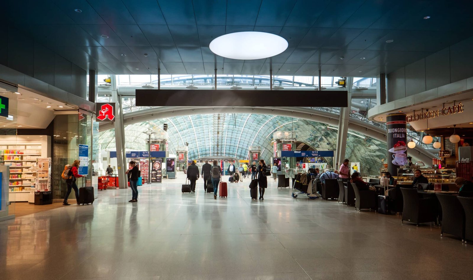 Frankfurt, Germany - Passngers people travelers inside AIRail Center Frankfurt alrge The Squaire building above the existing long-distance train station
