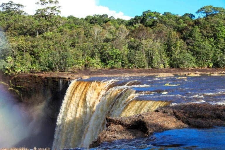 View of The beautiful powerful Kaieteur waterfall on a clear Sunny day against the background of the jungle, the height of the waterfall is 221 meters, Guyana.